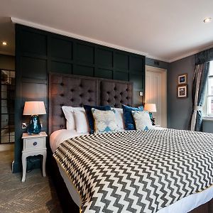 Boutique Rom med en king size seng